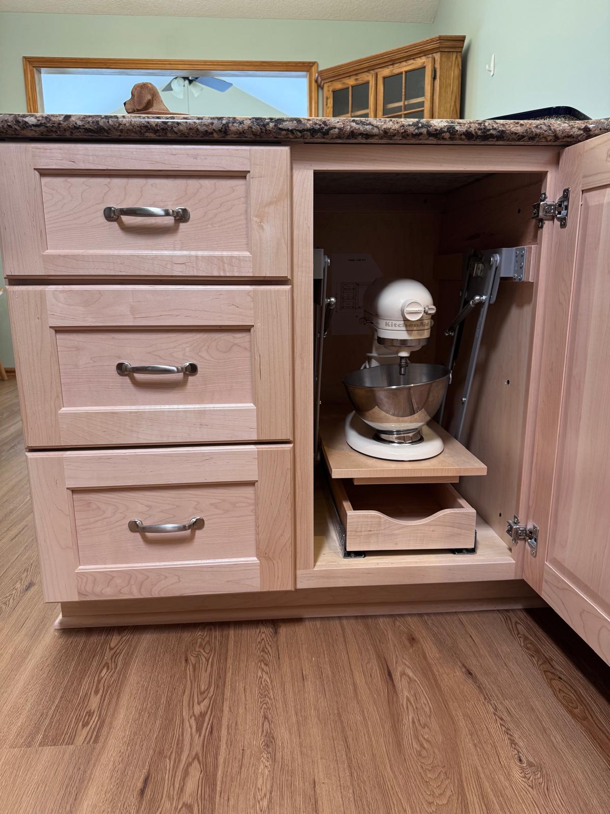close up kitchen remodel cabinetry with KitchenAid stand mixer pull out