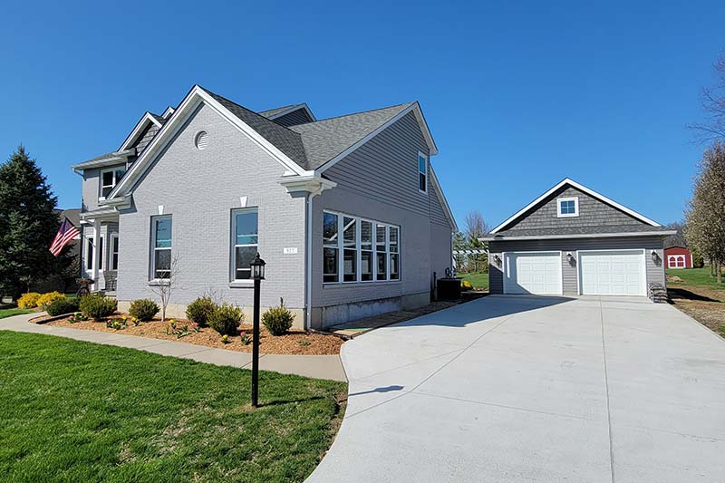 Garages featuring a two car garage with patio area